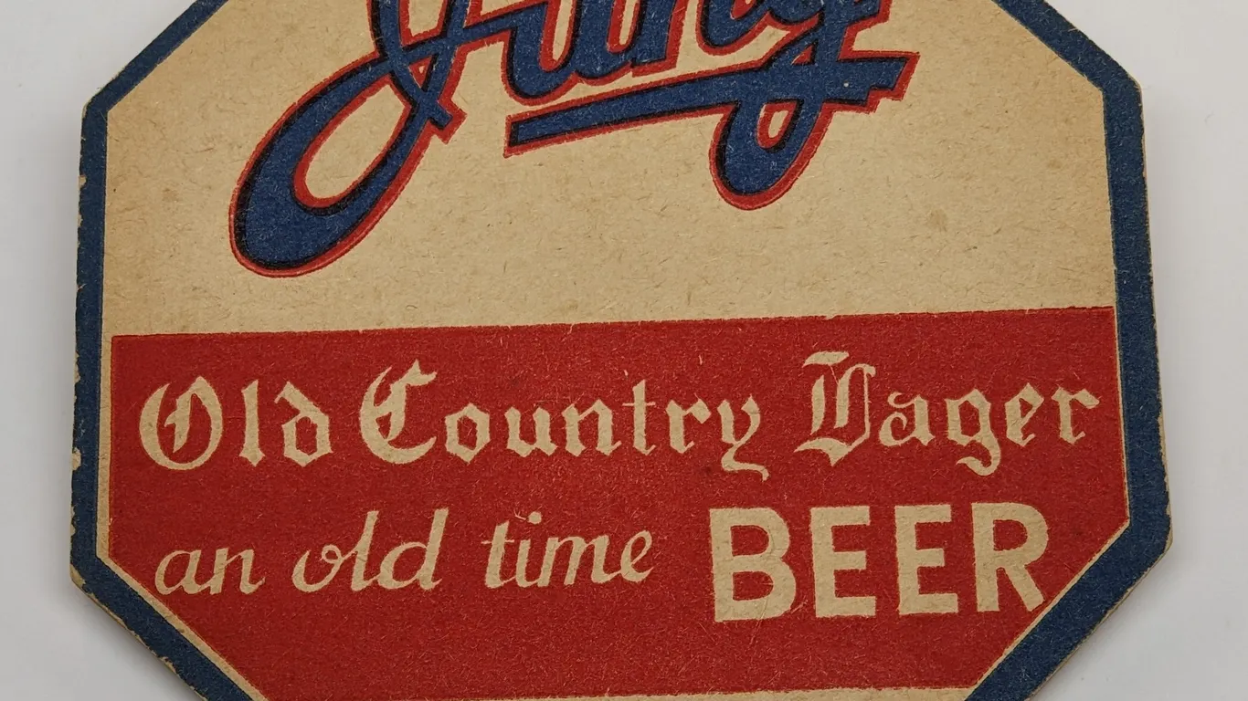 JUNG OLD COUNTRY BEER COASTER RANDOM LAKE WISCONSIN