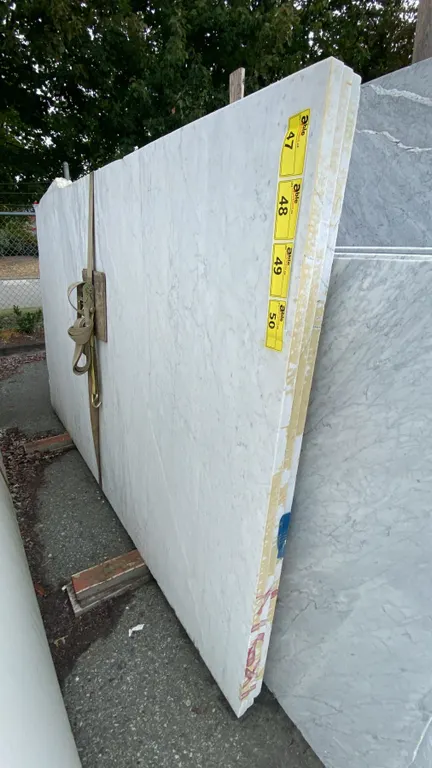 1 STONE COUNTERTOP SLAB WHITE WITH GREY GRAIN APPROX 8' 8"L X 5' 2"W X 1 1/4" THICK