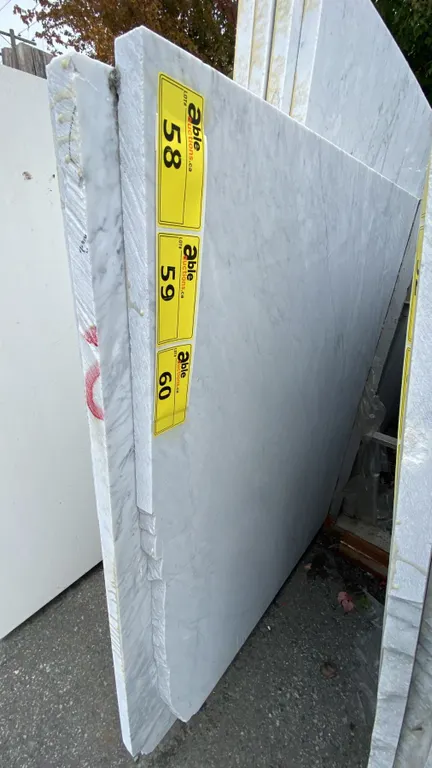1 STONE COUNTERTOP SLAB WHITE WITH GREY GRAIN APPROX 10' 3"L X 4' 2"W X 1 1/4" THICK