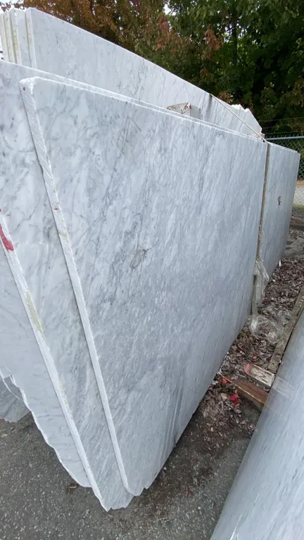 1 STONE COUNTERTOP SLAB WHITE WITH GREY GRAIN APPROX 10' 3"L X 4' 2"W X 1 1/4" THICK