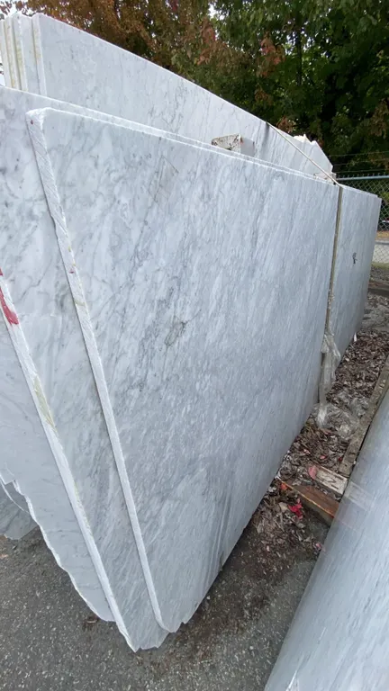 1 STONE COUNTERTOP SLAB WHITE WITH GREY GRAIN APPROX 10' 3"L X 4' 2"W X 1 1/4" THICK