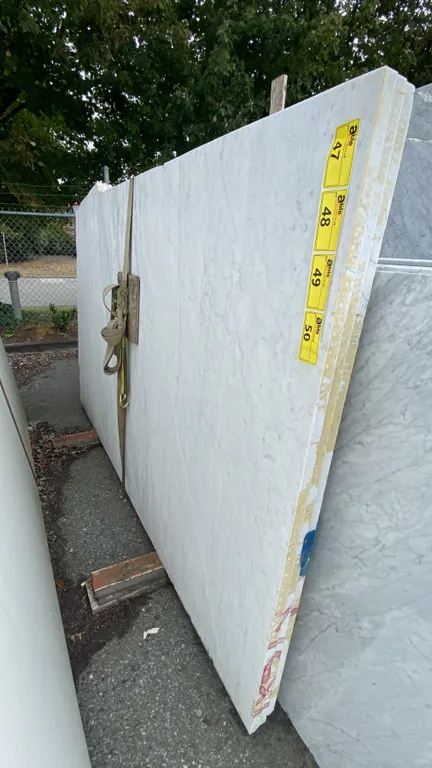 1 STONE COUNTERTOP SLAB WHITE WITH GREY GRAIN APPROX 8' 8"L X 5' 2"W X 1 1/4" THICK