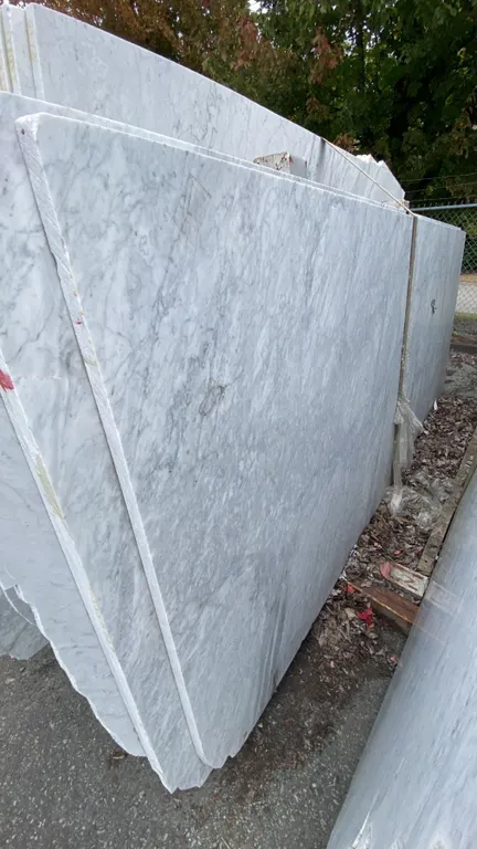 1 STONE COUNTERTOP SLAB WHITE WITH GREY GRAIN APPROX 10' 3"L X 4' 2"W X 1 1/4" THICK