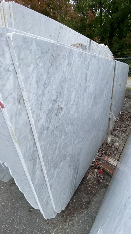1 STONE COUNTERTOP SLAB WHITE WITH GREY GRAIN APPROX 10' 3"L X 4' 2"W X 1 1/4" THICK