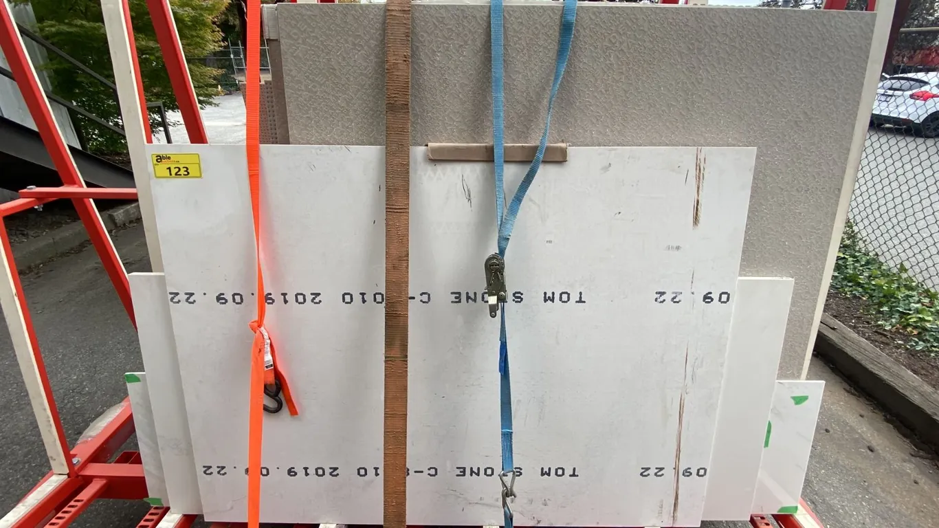 ASSORTED SIZE STONE MATERIAL APPROX 14PCS *A-FRAME RACK NOT INCLUDED*