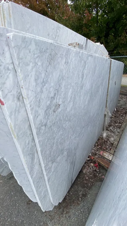 1 STONE COUNTERTOP SLAB WHITE WITH GREY GRAIN APPROX 10' 3"L X 4' 2"W X 1 1/4" THICK