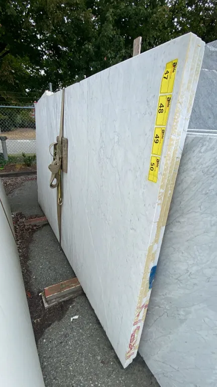 1 STONE COUNTERTOP SLAB WHITE WITH GREY GRAIN APPROX 8' 8"L X 5' 2"W X 1 1/4" THICK