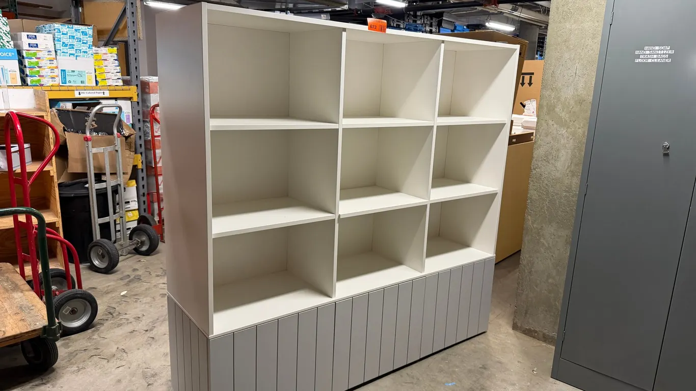 9-Cubby Cabinet with Hidden Shelves on the Bottom