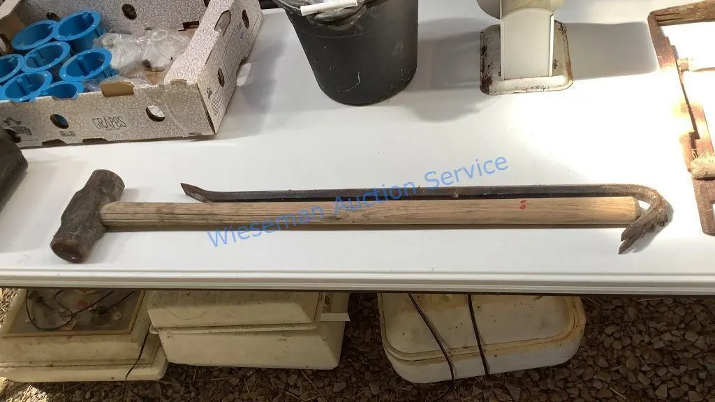 SLEDGE HAMMER AND CROW BAR