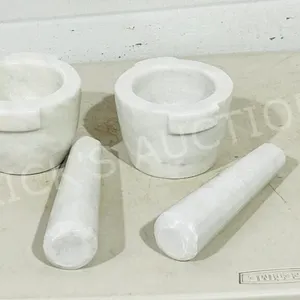 pair of white marble mortar & pestles