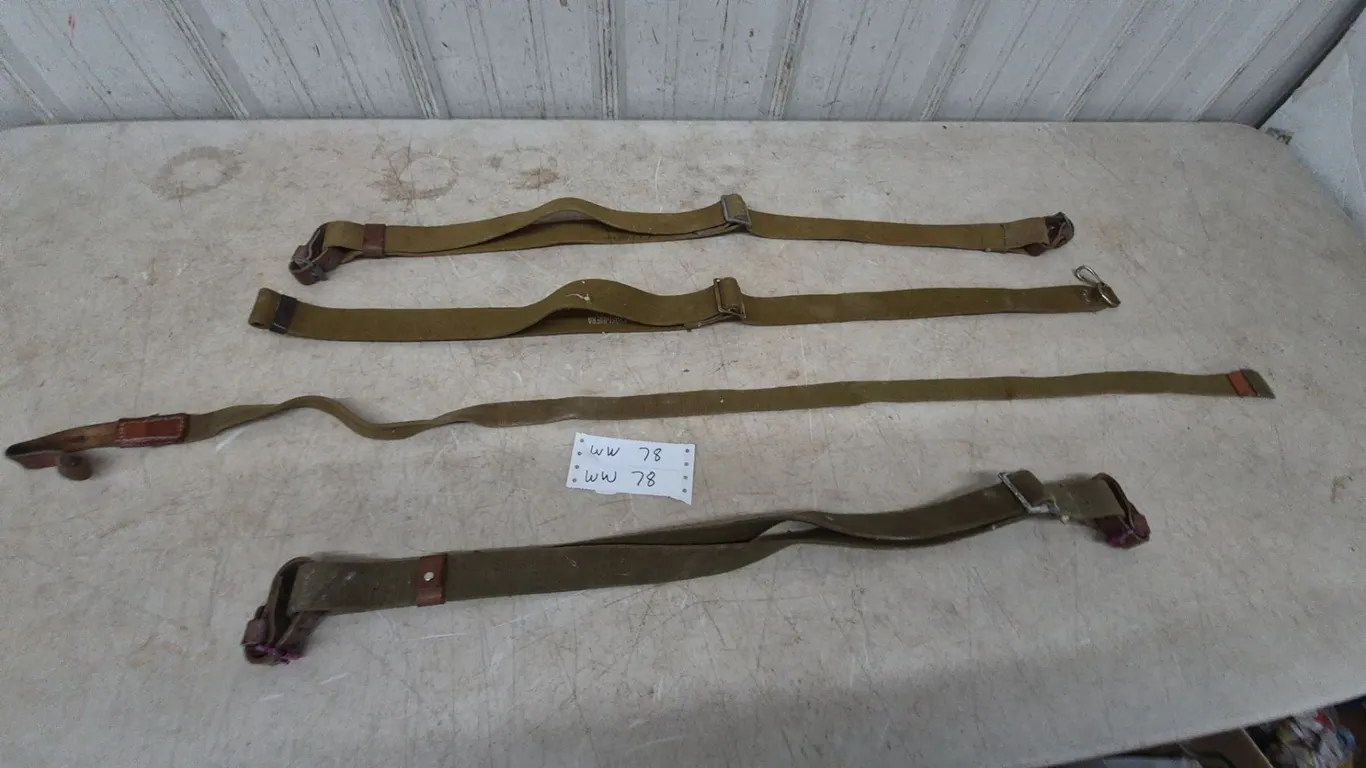 Four Military Canvas and Leather Rifle Slings