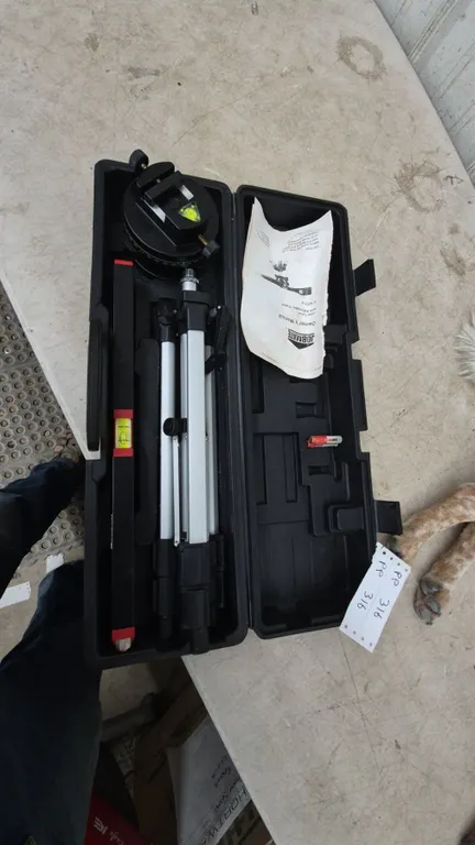 Jobmate Laser Level with Adjustable Tripod, Owner's Manual, and Case