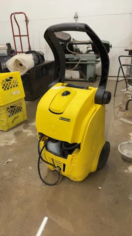 Kärcher Electric Pressure Washer with Integrated Wheels, Handle, and Hose Storage Compartment