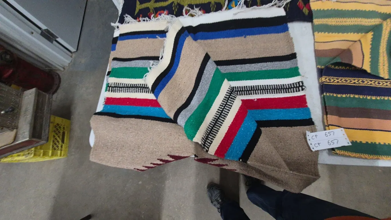 Three Woven Rugs, One with Birds and Trees, Two Striped