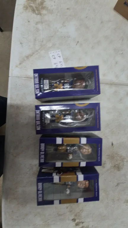 Four Limited Edition Blue Bombers Bobbleheads: Wilson and Oliveira