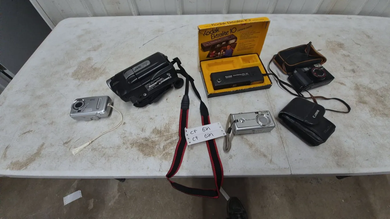 JVC Digital Video Camera; Kodak Ektralite 10 Camera Outfit; Canon AF35M II and PowerShot A400