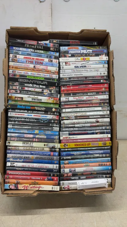 74 Assorted DVDs Including The Dark Knight, Zoolander, American Beauty