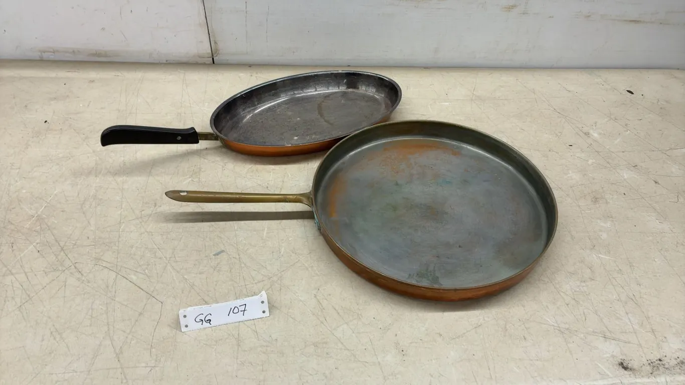 Two Copper Frying Pans With Brass and Black Plastic Handles, Round Table 14” and Oval, 14 × 8”