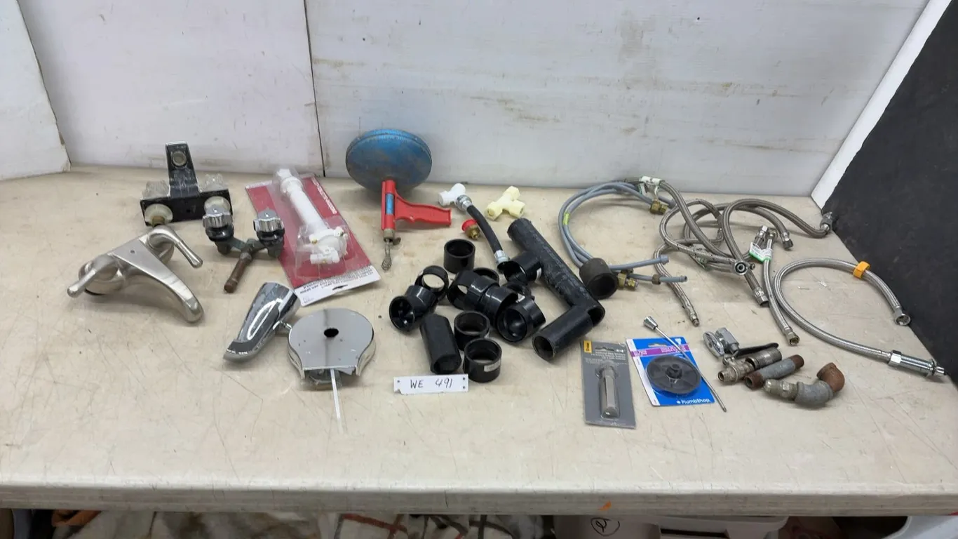 Assorted Plumbing Parts Including Watts Faucet Supply Lines, PlumbShop Flapper Kit, Titan Tool