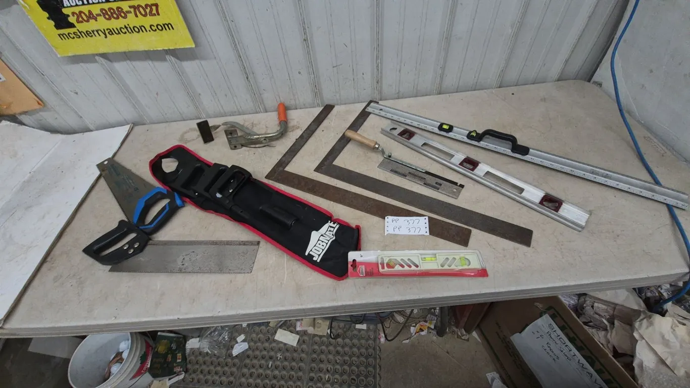 Jobmate 9” Level, Mastercraft Hand Saw, Jobmate Saw Set, Trowel, Squares