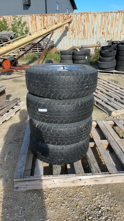 Motomaster Total Terrain LT235/75R15 Tires On 1989-96 F150 Chrome Wheels, 4-Piece Lot