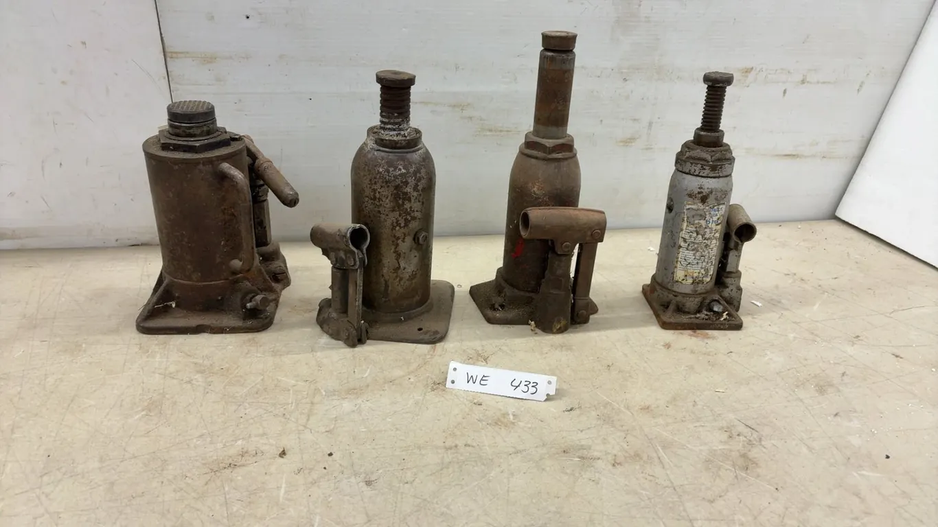 Four Hydraulic Bottle Jacks Including Walker Manufacturing 6 Ton