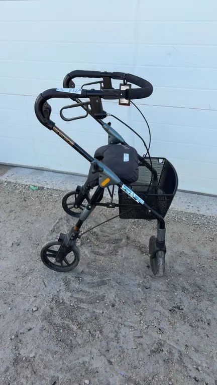 Evolution Xpresso Four-Wheeled Rollator Walker With Padded Seat and Mesh Storage Basket
