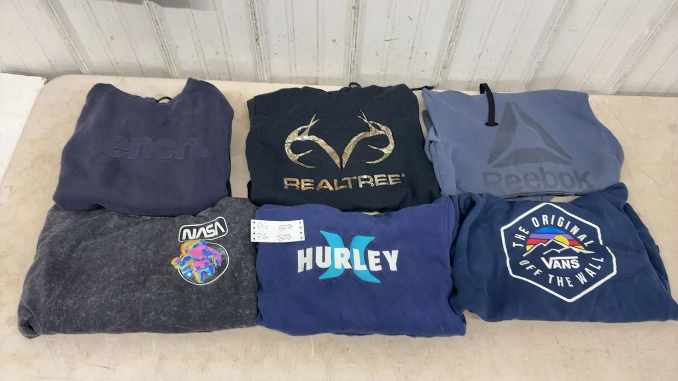 6 Hoodies, Reebok, Realtree, Vans, Hurley, NASA, Bench. 3 small, 2 Medium, and 1 Large