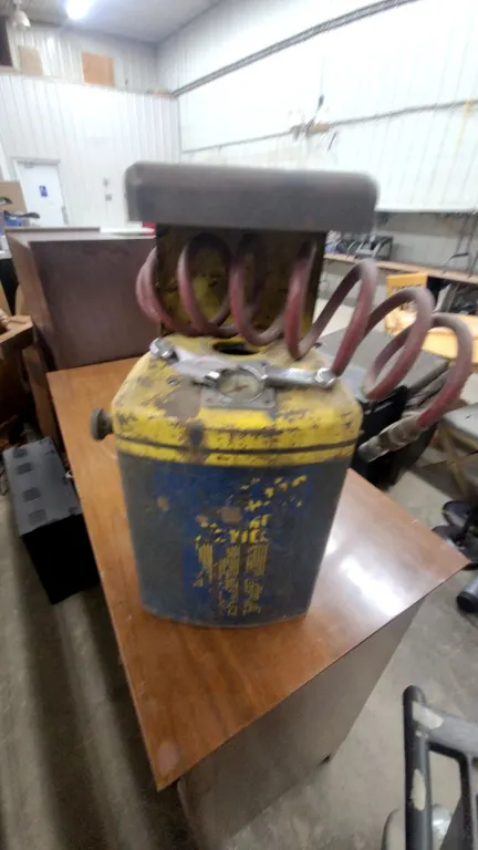 Vintage Blue and Yellow spark plug cleaning machine