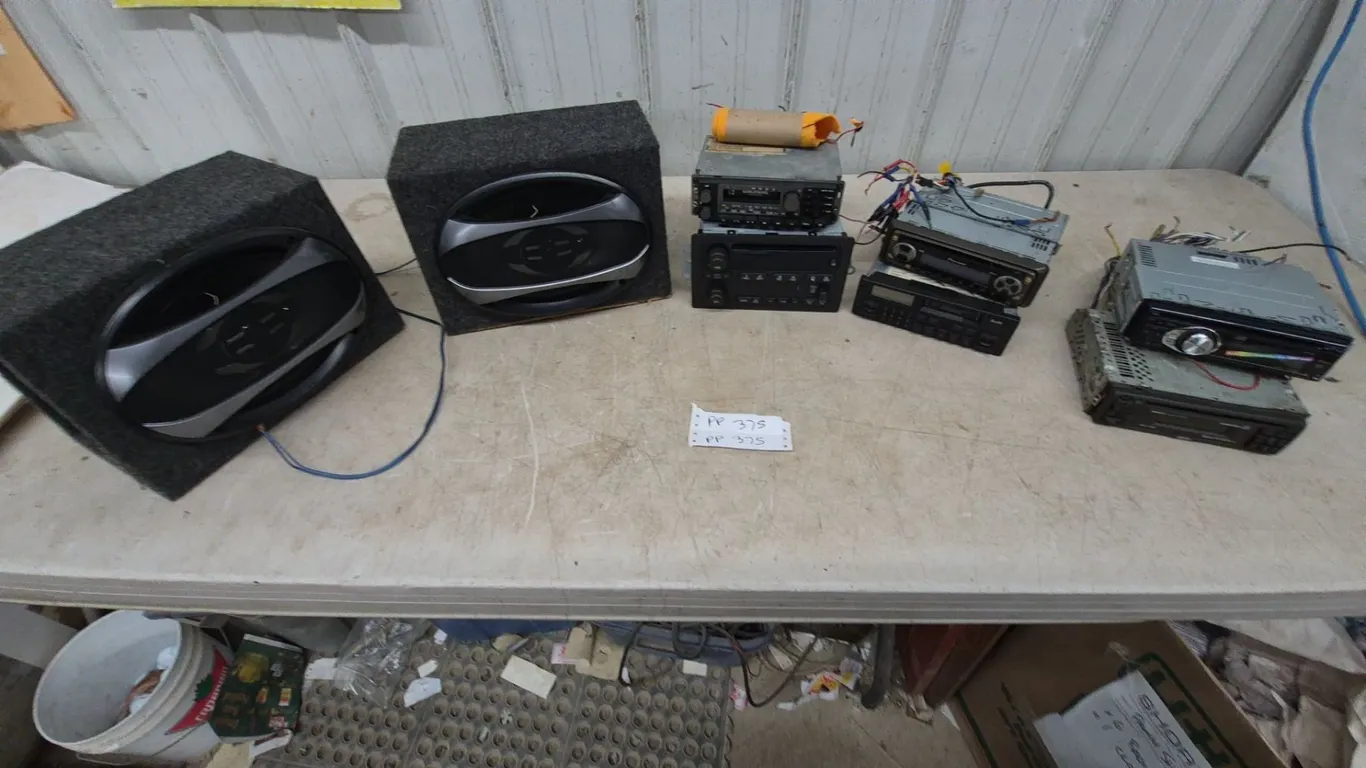 Car Audio Lot: 2 Pyle 6 × 9” Speakers in Enclosures, Grundig and GM Car Stereos