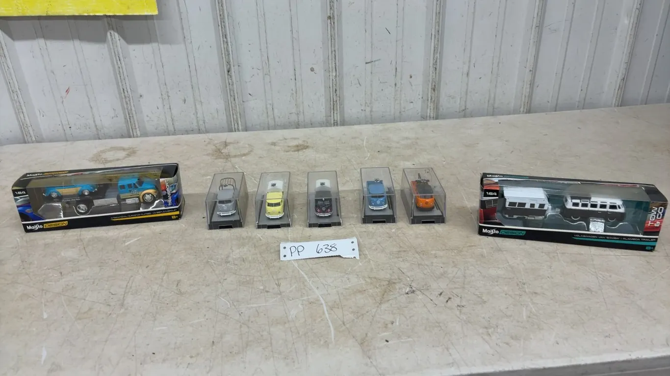 7 Diecast Cars, M2 VW Vans, Maisto VW Van with Camper, and Maisto Flatbed Semi With VW Beetle