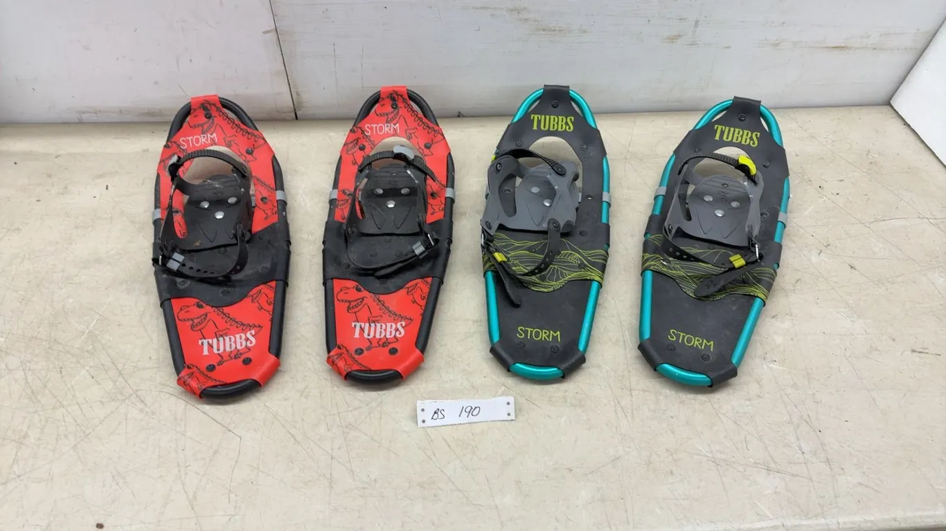 Two Pairs of Tubbs Storm Kids' Snowshoes, Red Dinosaur Pattern and Black with Teal Frame