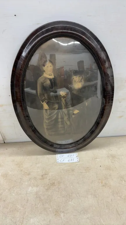 Antique Oval Framed Portrait Photograph with Dark Wood Frame and Convex Bubble Glass, 23 × 17”
