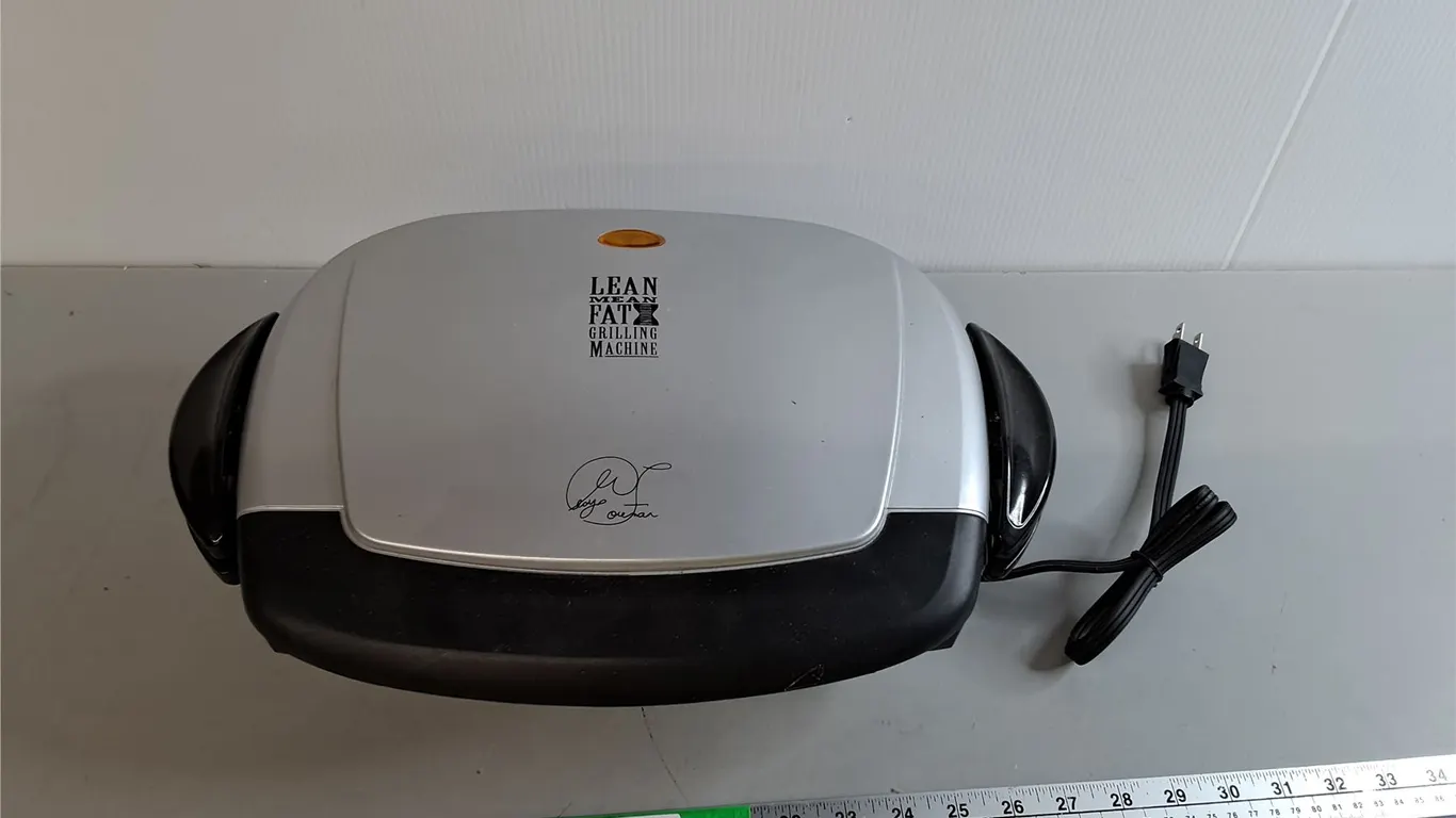 George Foreman Lean Green Fat Grilling Machine- Powers On