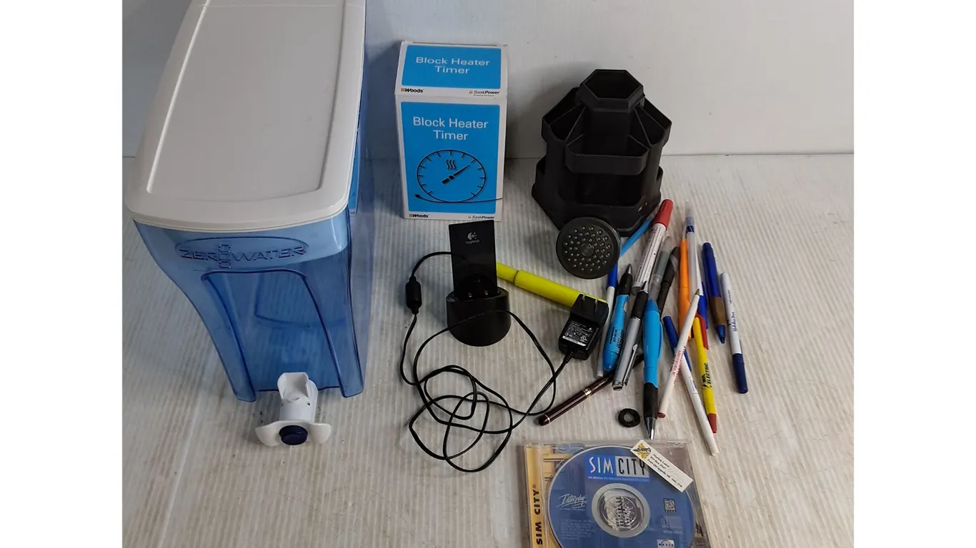 Zero Water Dispenser, Desk Caddy, Block Heater Timer, Sim City CD Game, Assorted Pens