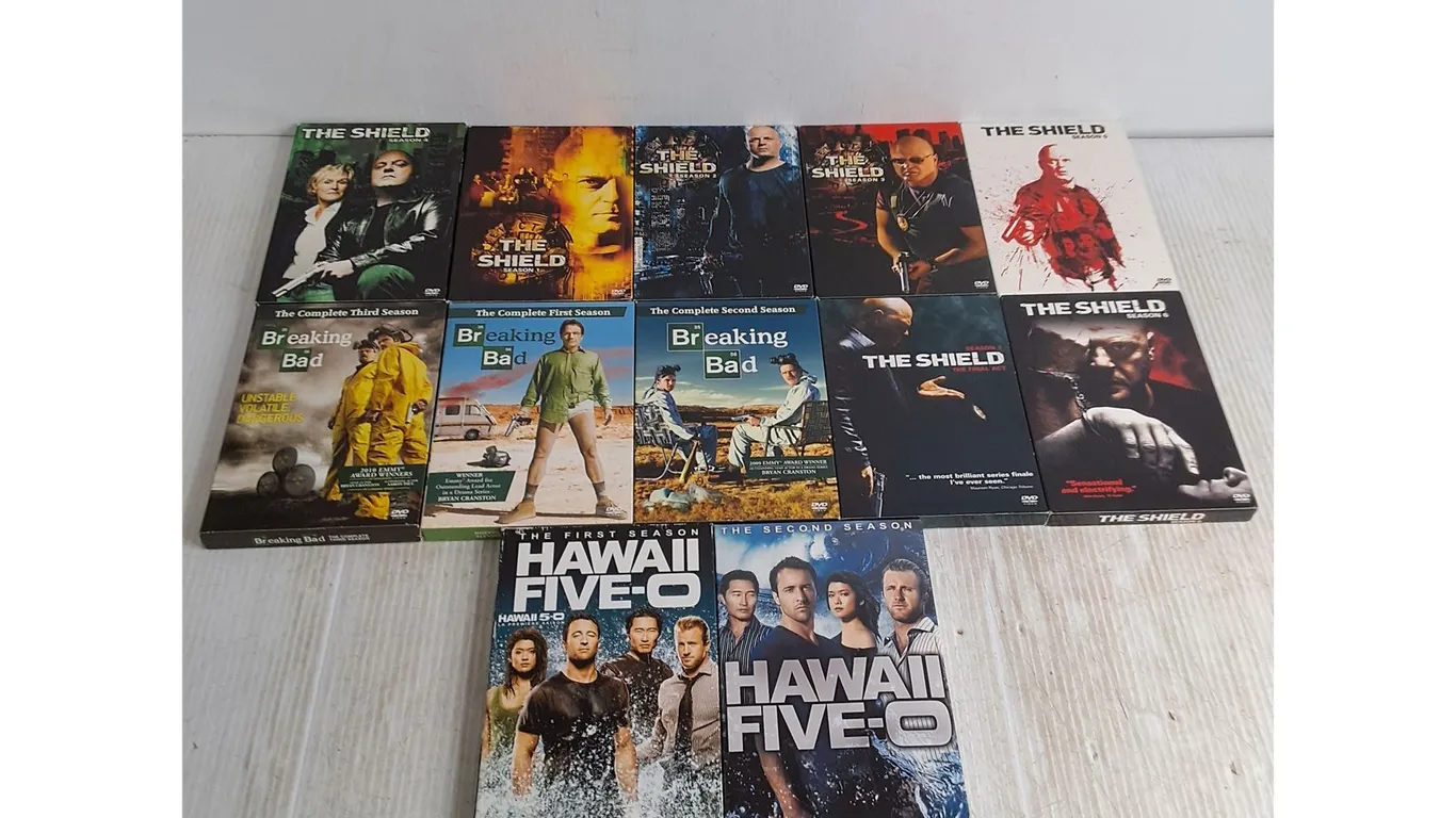 (12) DVD Box Sets (The Shield, Breaking Bad, Hawaii 5-O)