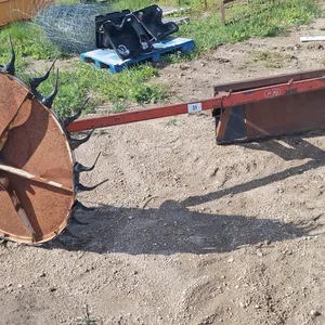Heavy duty build skid steer attachment with single hay rack