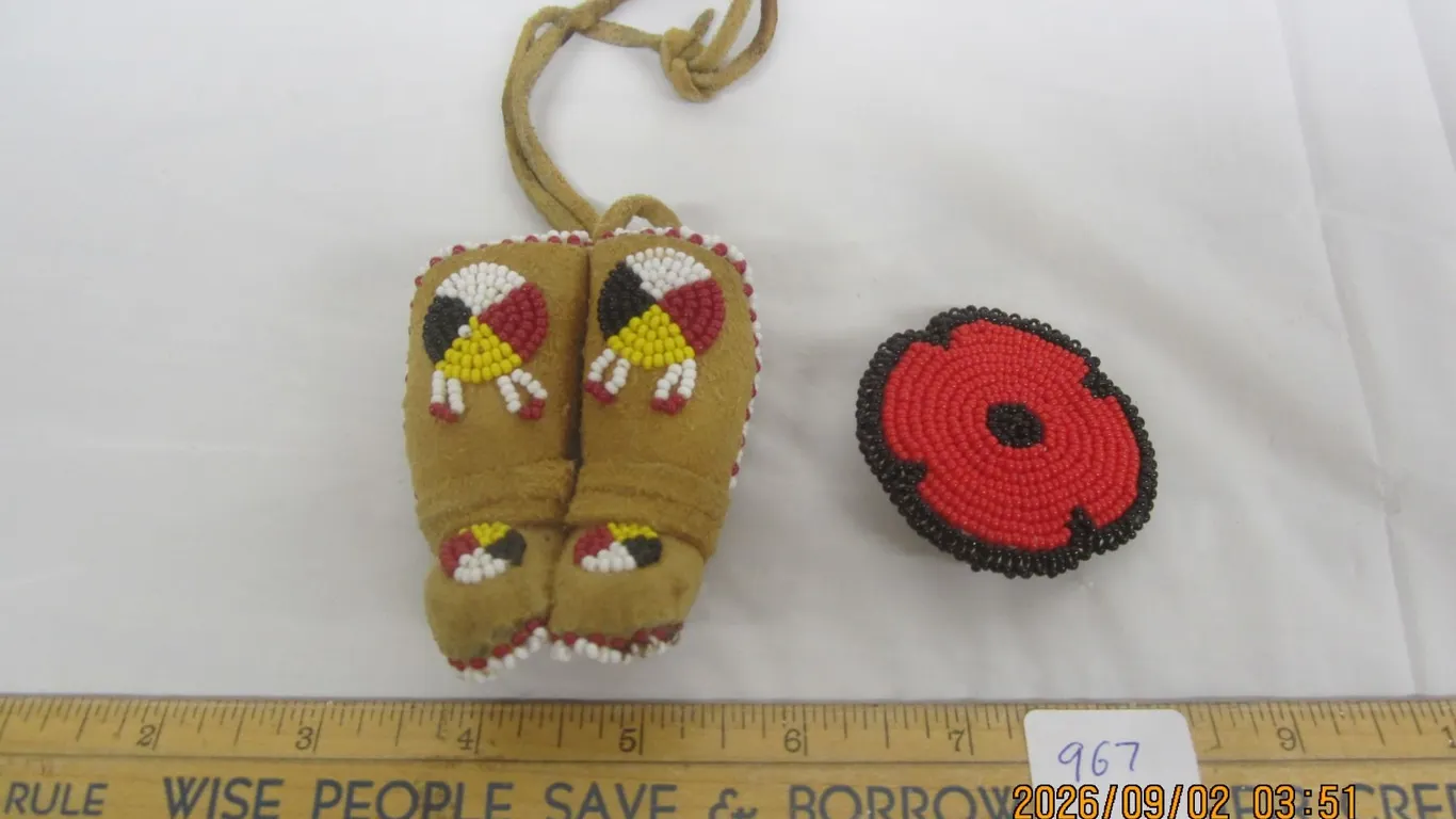 968. Native American Ornamental Baby Boots Hand Beaded and a Beaded Poppy Pin