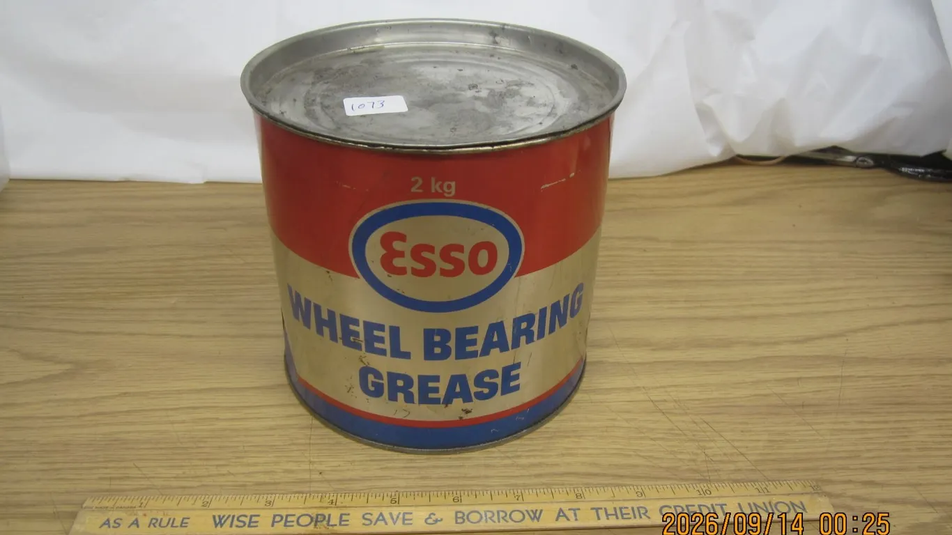 1073. Large Vintage ESSO Grease Can Half Full