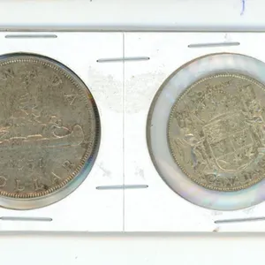 1951 Silver Dollar and 50 Cent Silver Coin