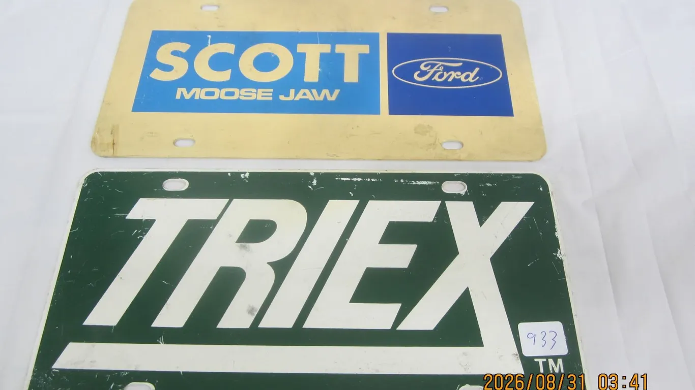 933. 2 Vintage New Car Front Plates Scott Ford Moose Jaw and Triex