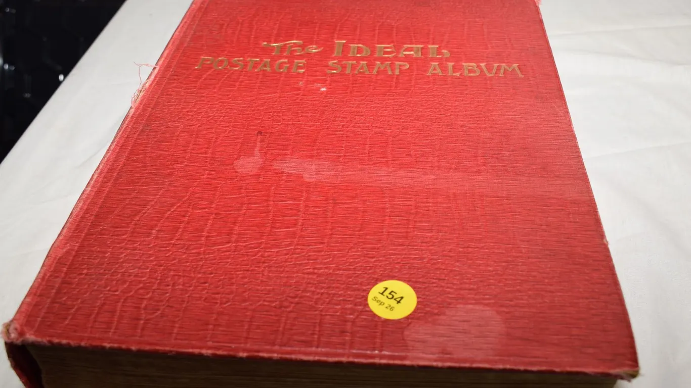 Stamp Album w/ Many Stamps