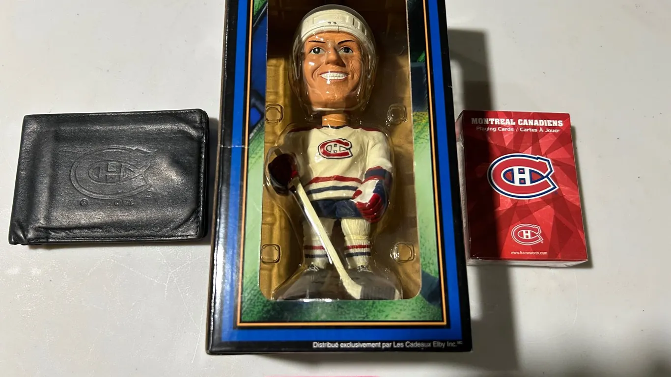 Montreal Canadiens’ collectibles – leather wallet, poker size playing cards and bo