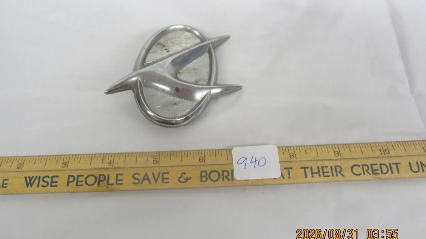 940. Antique Impala Emblem
