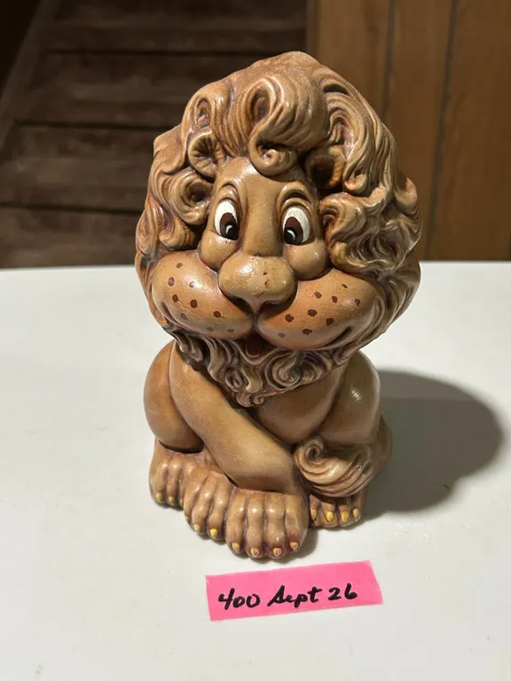 Happy Lion ceramic coin bank