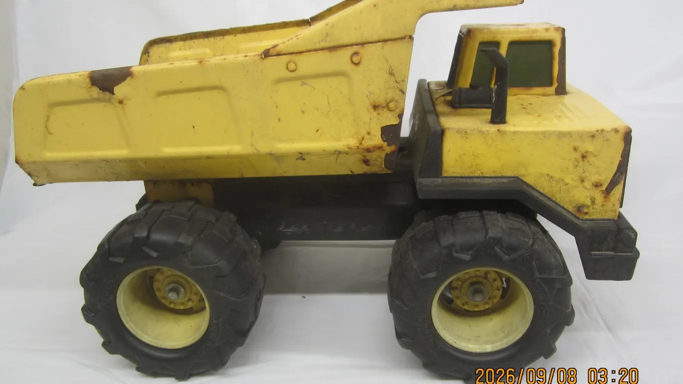1015. Vintage Yellow Tonka Dump Truck