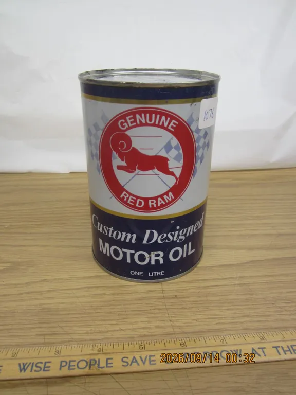 1076. Vintage Red Ram Oil Can Full Rare Can