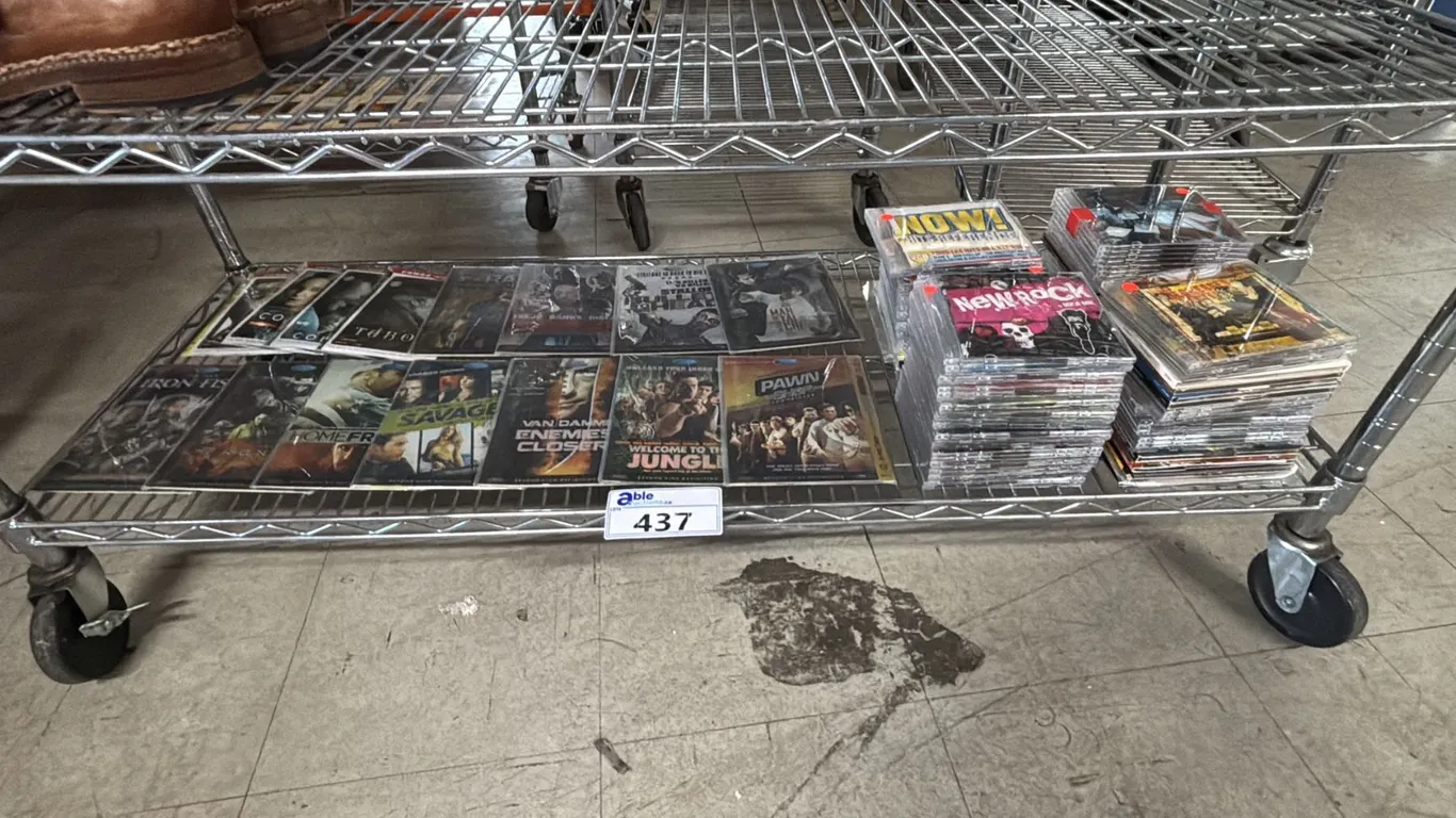 SHELF OF ASSORTED DVD'S & CD'S