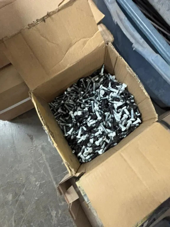 Box of White and Black Powder coated Bolts