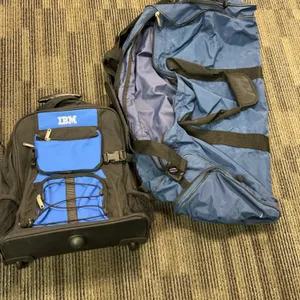 2 Bags: IBM Rolling Backpack and Large Nike Blue Sports Duffel Bag, Approx. 28 Inches Long, Used